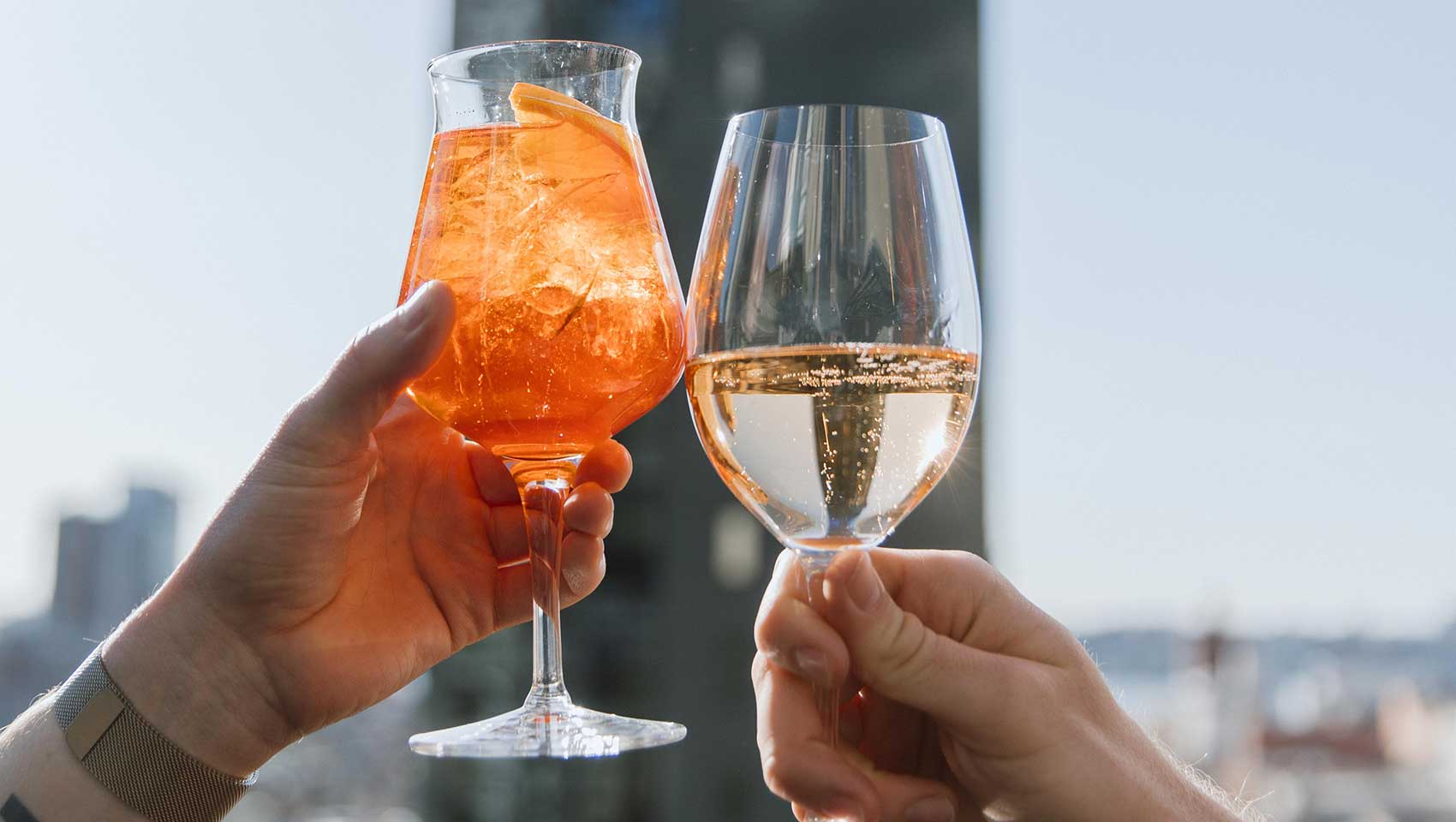 Cocktail cheers on Kimpton Theta New York - Times Square terrace