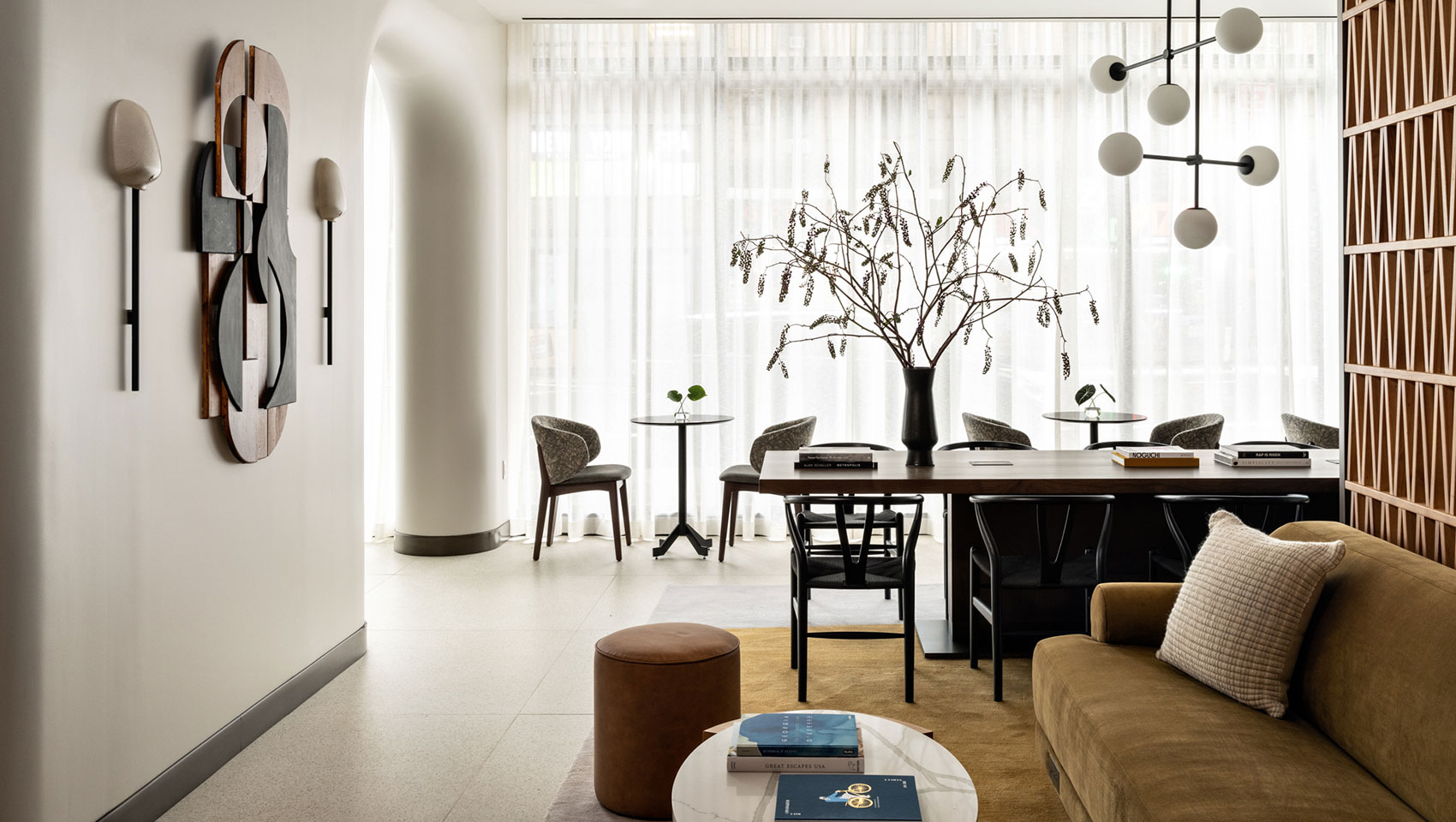 table and couch at Kimpton Theta